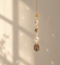 Attrape soleil cristal et fleur dorée