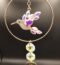 Attrape soleil avec un colibri irisé
